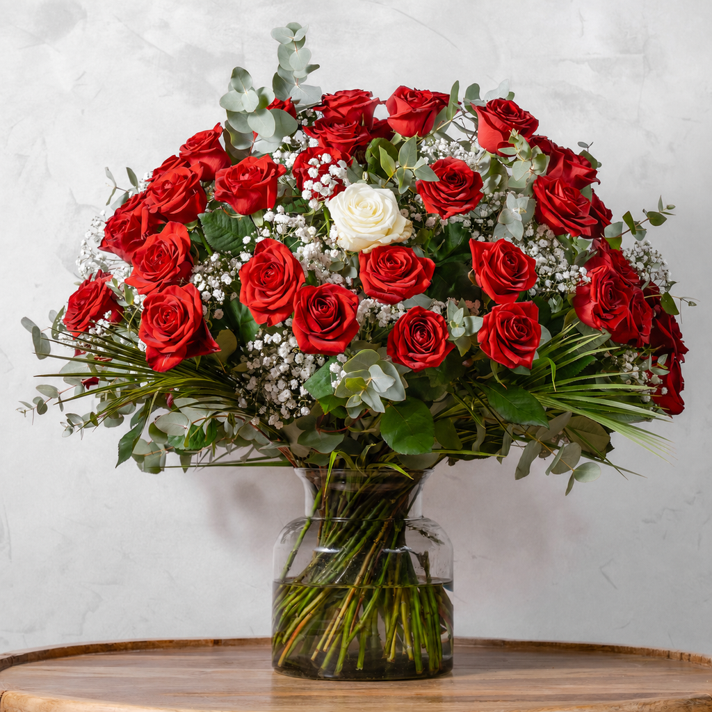 Fifty Red & One White Roses bouquet, fifty red roses accented with a single white rose