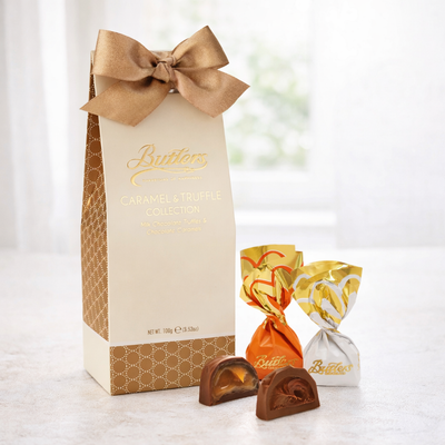 Gourmet chocolate collection with a decorative box on a white background
