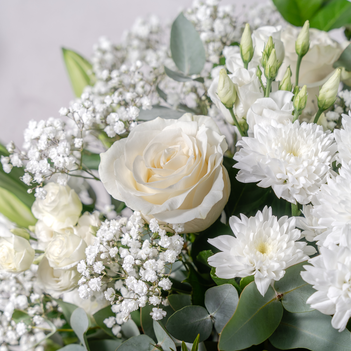 Tranquility bouquet soft green foliage and white blooms detail Dublin florist