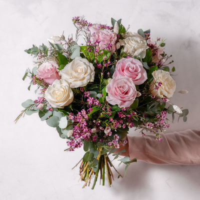 Dreamy bouquet of blush pink and pale cream roses hand-tied by The Flower Factory, Dublin