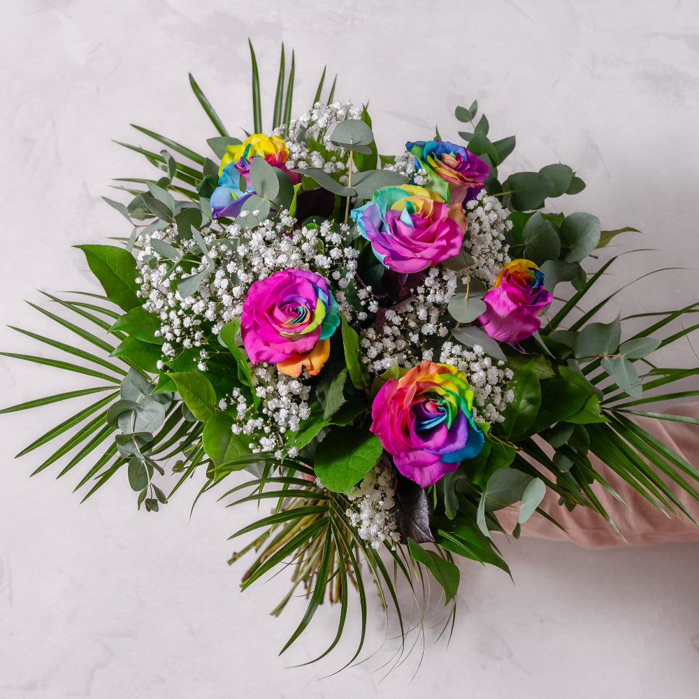 Half dozen rainbow roses with multi-coloured petals 