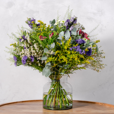 Hand-tied wild flower bouquet full arrangement side view The Flower Factory